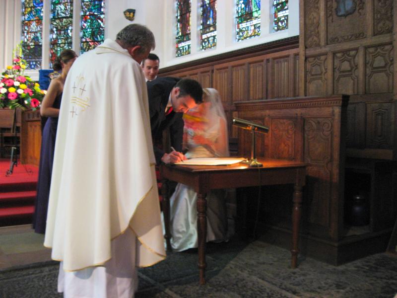 CandJwed-141.jpg - signing the marriage register in Kings
