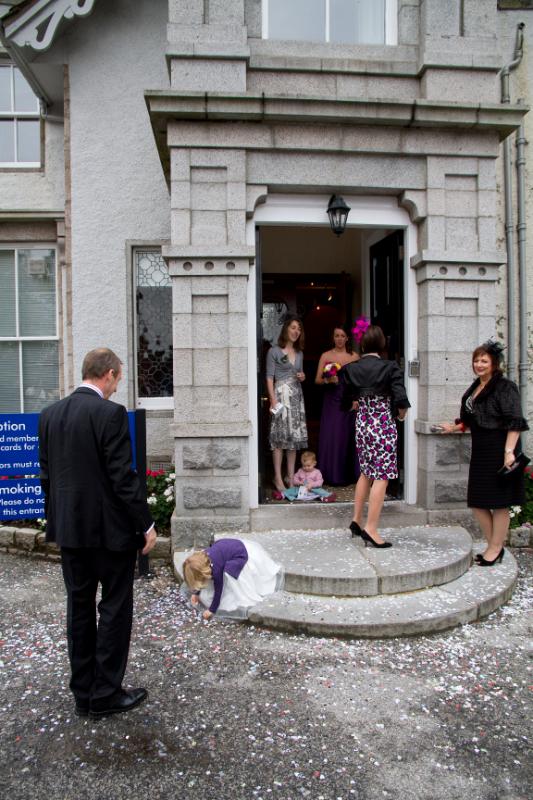 CandJwed-291.jpg - Arabella tries to collect the confetti