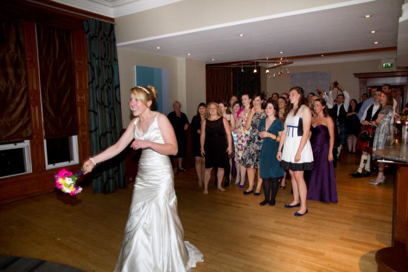CandJwed-503.jpg - Judith throws her bouquet (well ... it worked for her after she caught the one at Ailsa's wedding!)