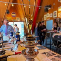 20260321-032 21/3/2026. The 31st Universities of Aberdeen Boat Race. A stack of trophies.