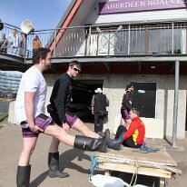 20260321-034 21/3/2026. The 31st Universities of Aberdeen Boat Race. Alumni crew stretches these old (??) muscles!